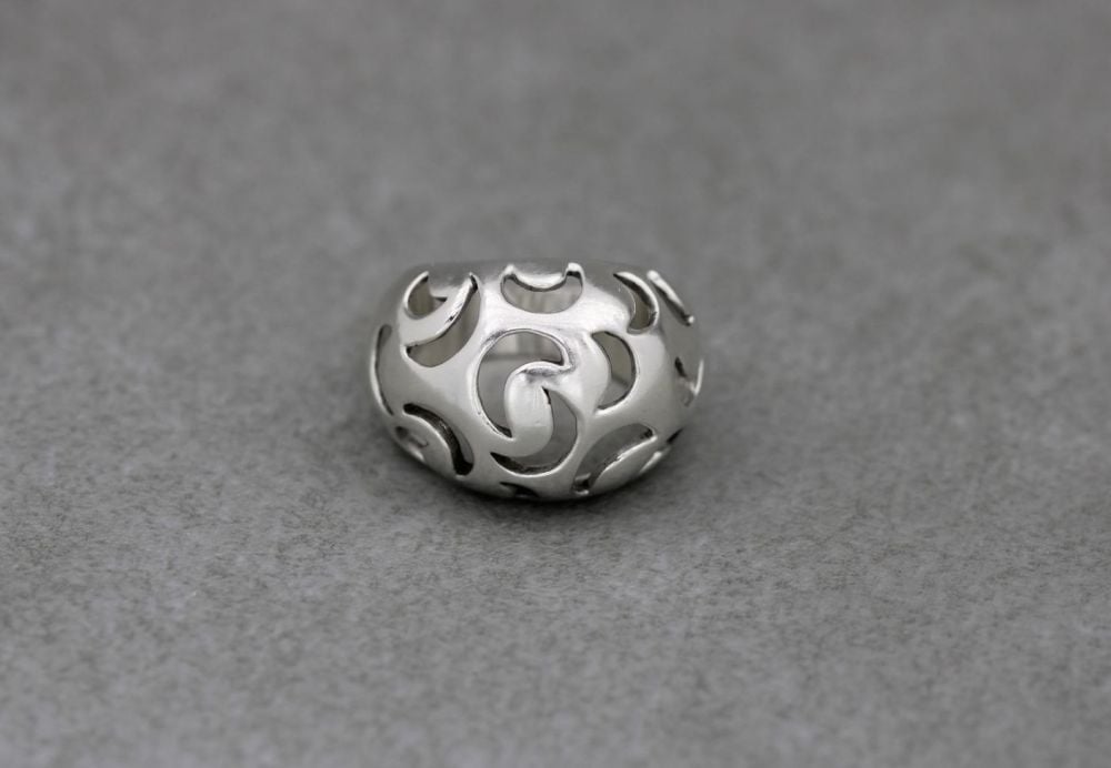 Domed sterling silver ring with cut-out moons