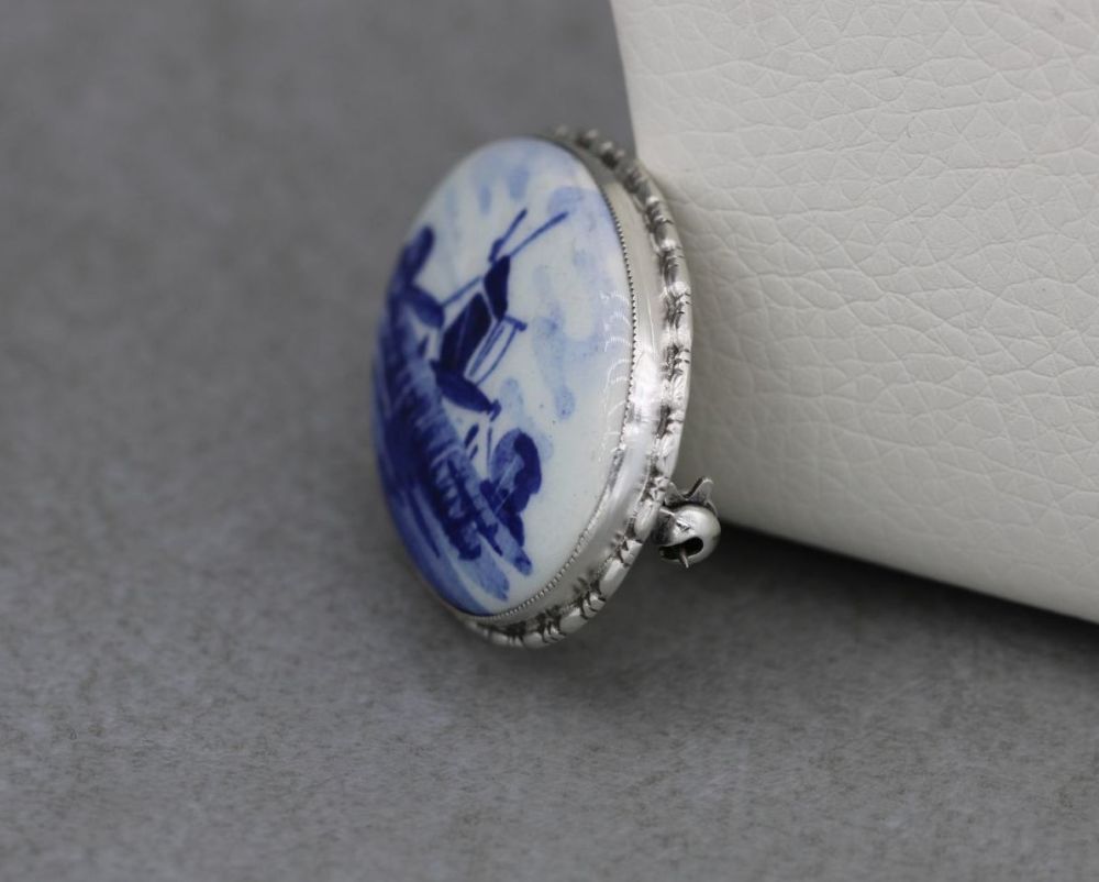 REFURBISHED Sterling silver brooch with a ceramic blue & white windmill scene