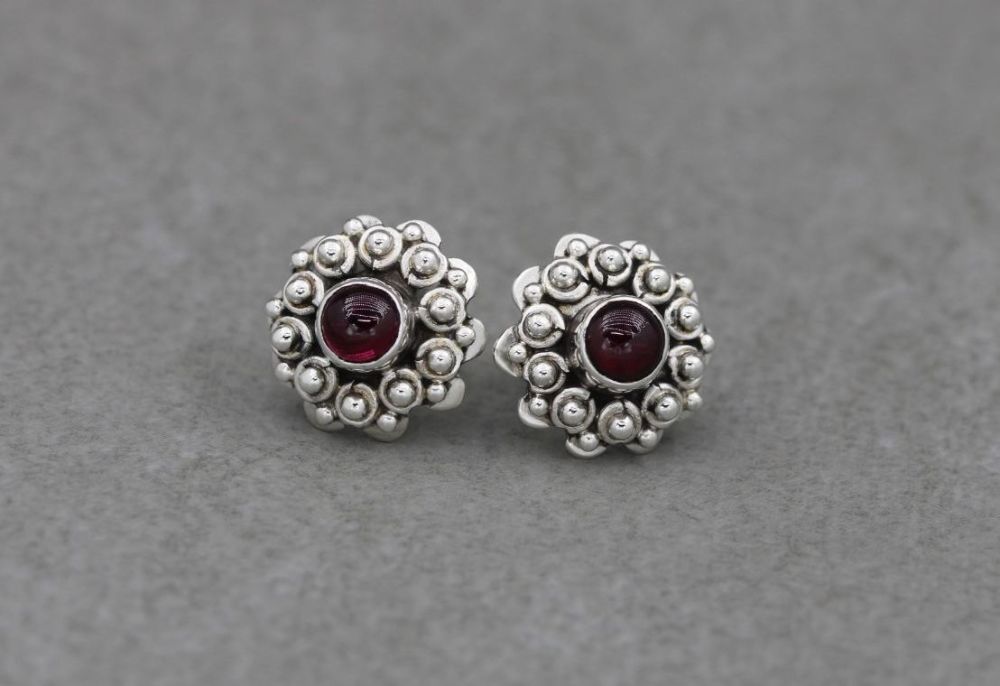 Fancy Bali sterling silver & garnet stud earrings