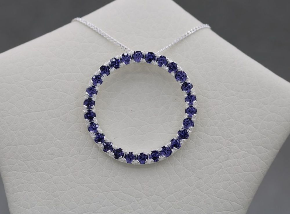 Sterling silver & tanzanite colour stone circle necklace