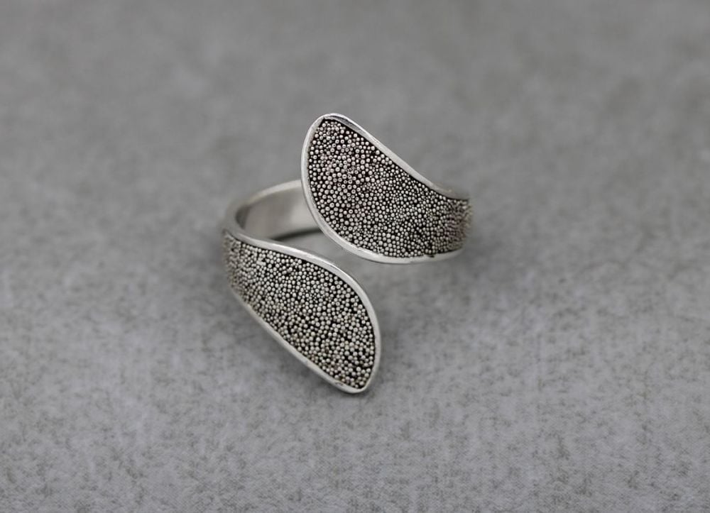 Wide textured sterling silver bypass ring