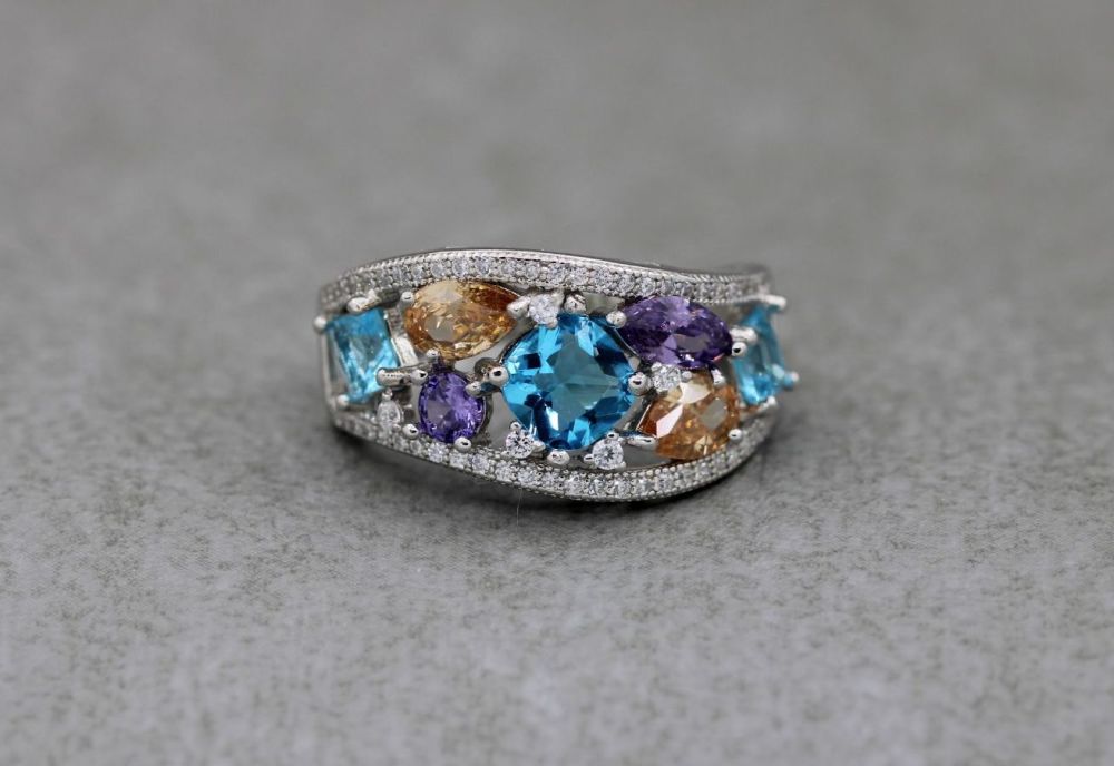 Graduated sterling silver ring with multi-colour stones