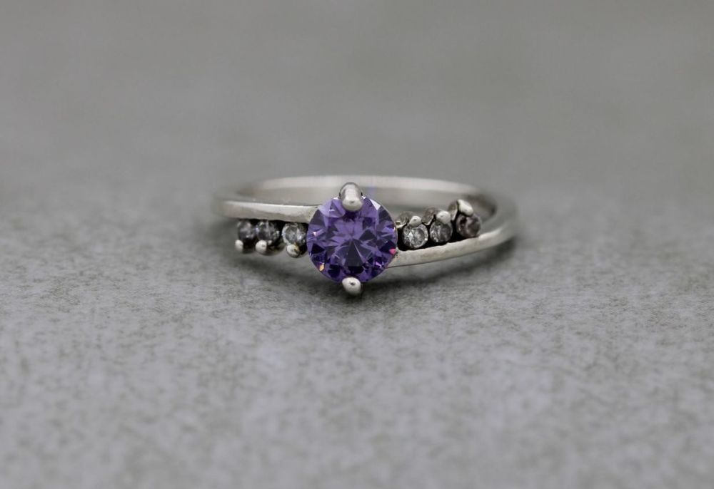 Sterling silver ring with purple & clear stones