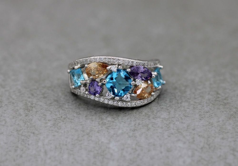 Graduated sterling silver ring with multi-colour stones