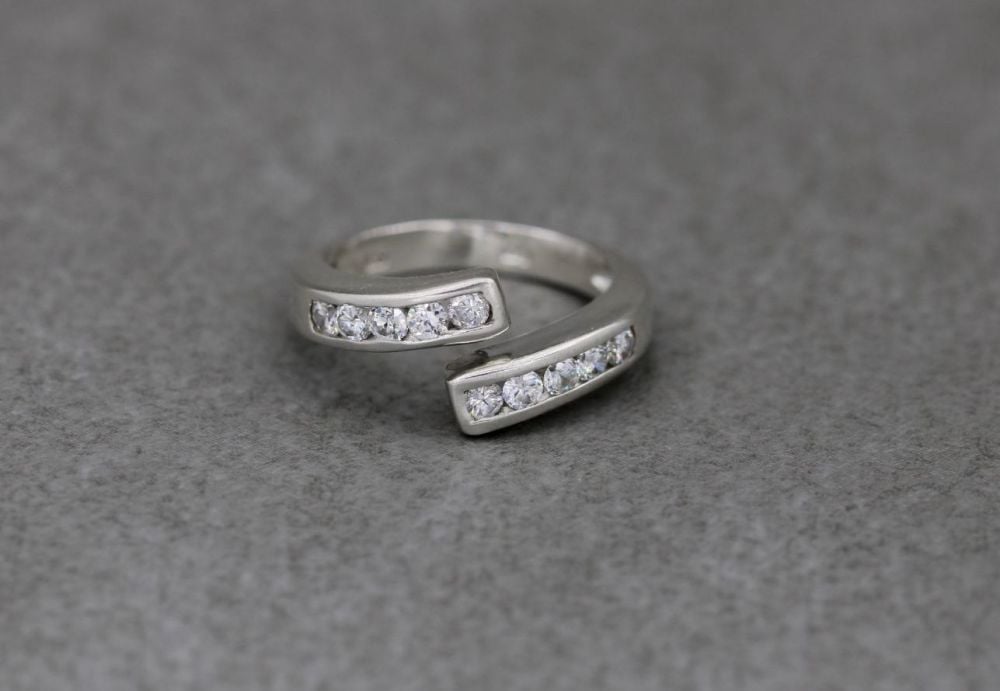 Sterling silver & clear stone bypass ring