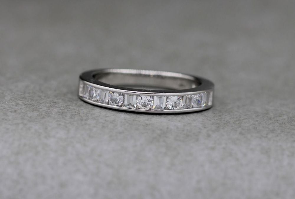 Sterling silver ring with classic round & rectangular cut clear stones