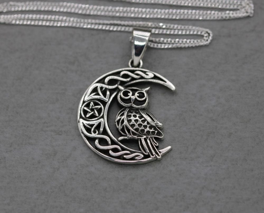 Sterling silver owl in a crescent moon necklace