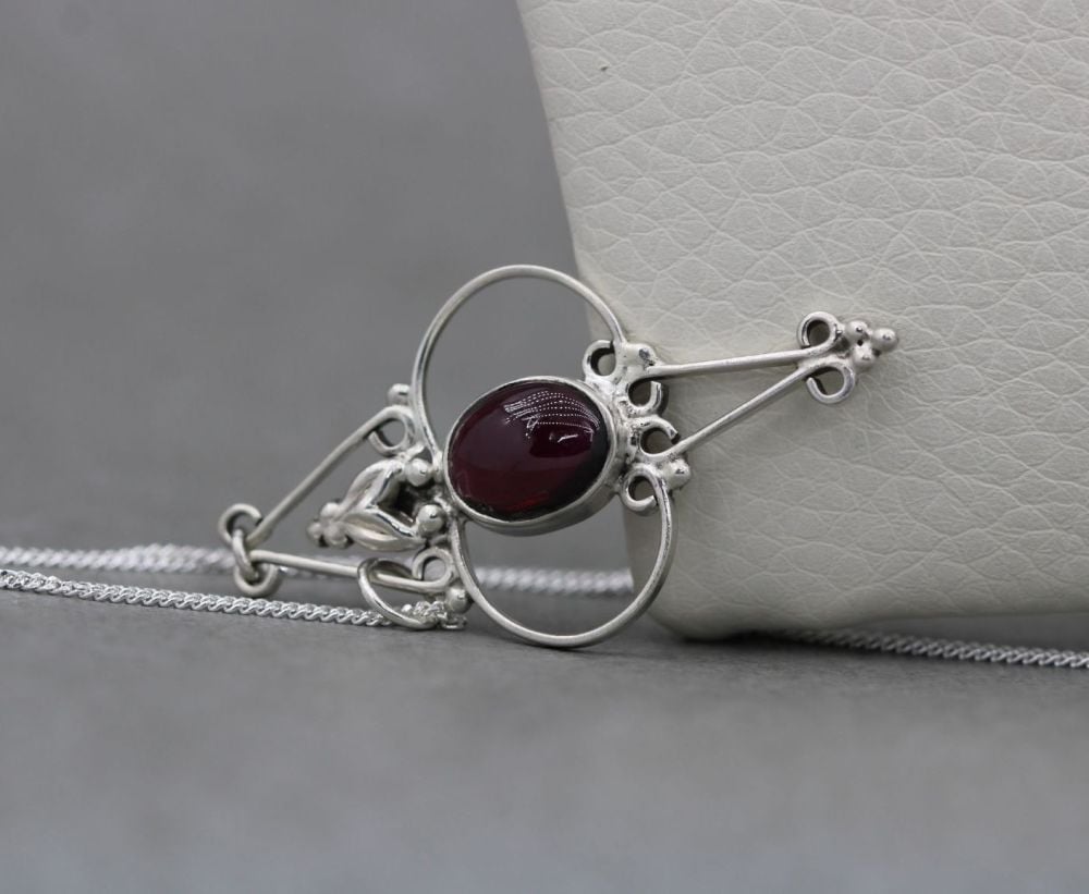 Fancy sterling silver & garnet necklace