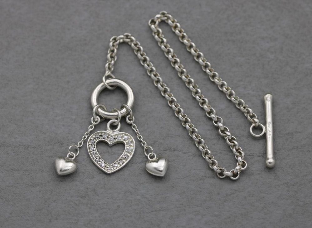 Sterling silver toggle bracelet with a trio of hearts