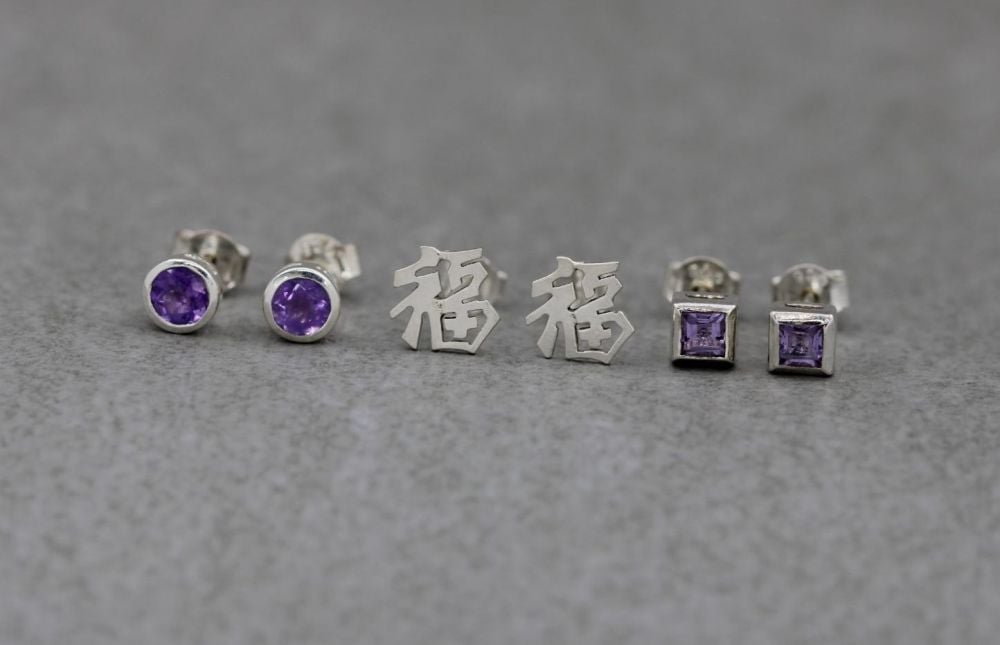 3 x pairs of sterling silver stud earrings; amethyst, oriental script & squ