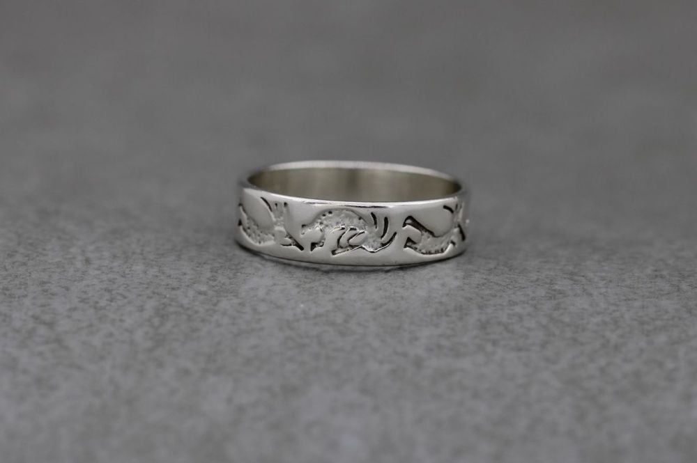 South western sterling silver ring; Kokopelli stamped band