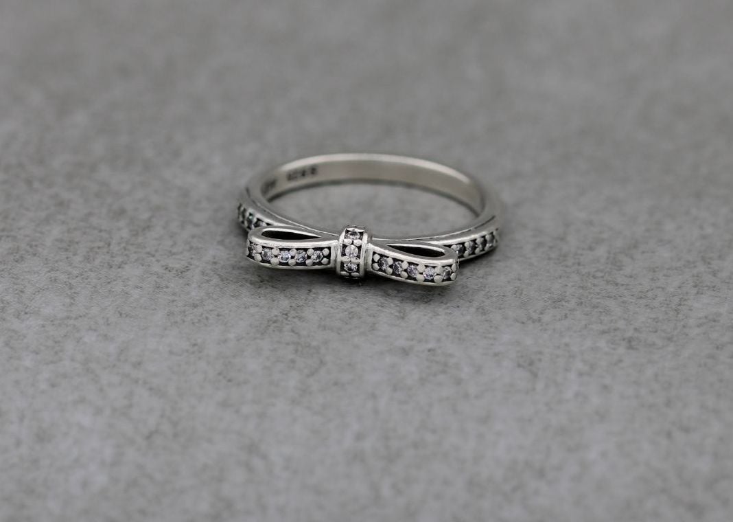 Pandora sterling silver & clear stone bow ring