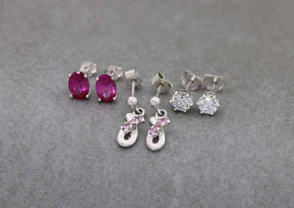 3 x pairs of sterling silver earrings; deep pink oval, classic clear & pale
