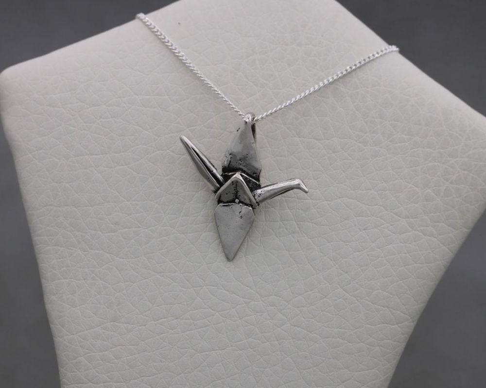 Small sterling silver origami bird necklace
