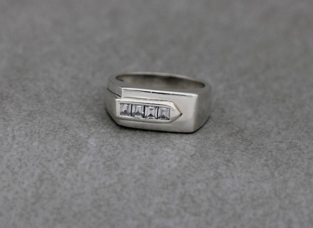 Bold asymmetric sterling silver ring with clear square stones