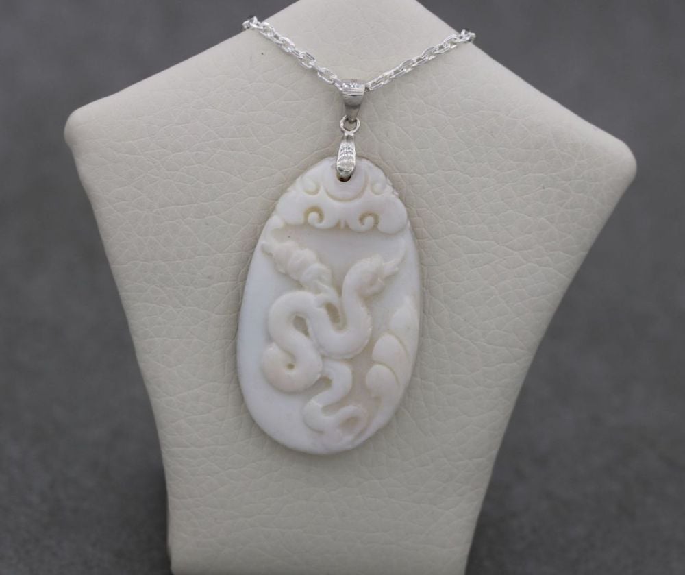 Sterling silver & mother of pearl necklace with a carved snake