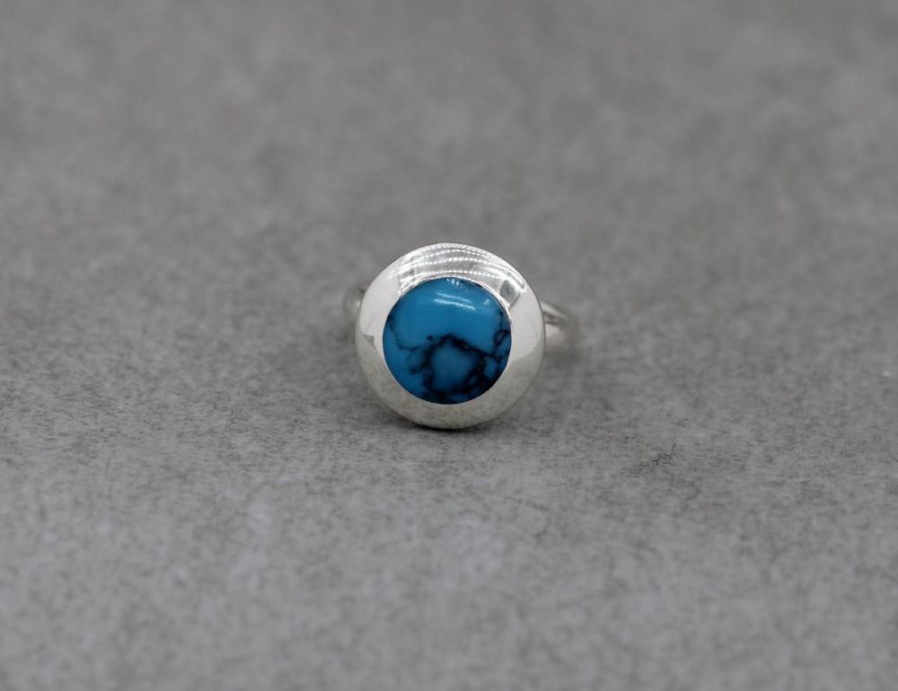 Circular sterling silver & blue howlite ring