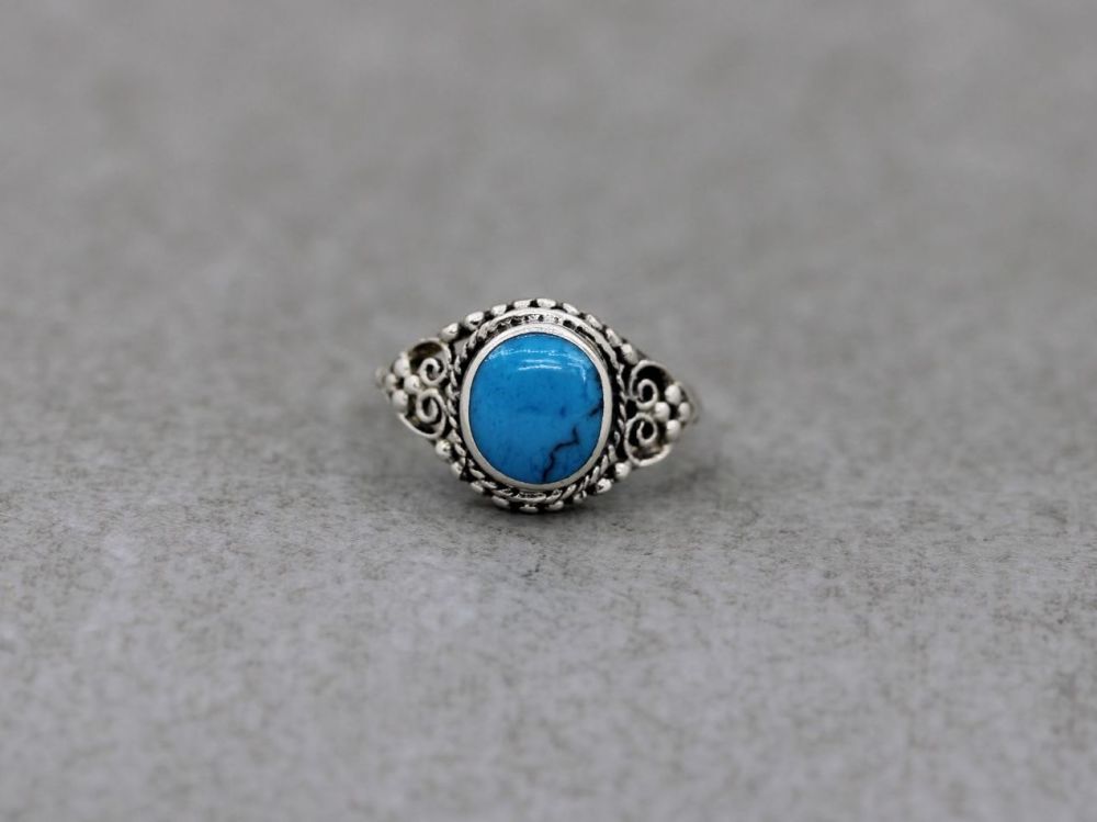 Sterling silver & blue howlite ring with scroll & dot detail shoulders