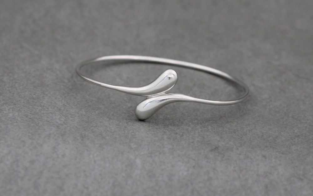 Sterling silver domed bypass bangle