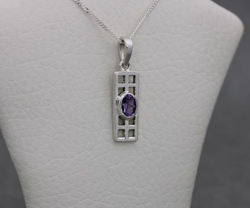 Small sterling silver & faceted purple stone necklace