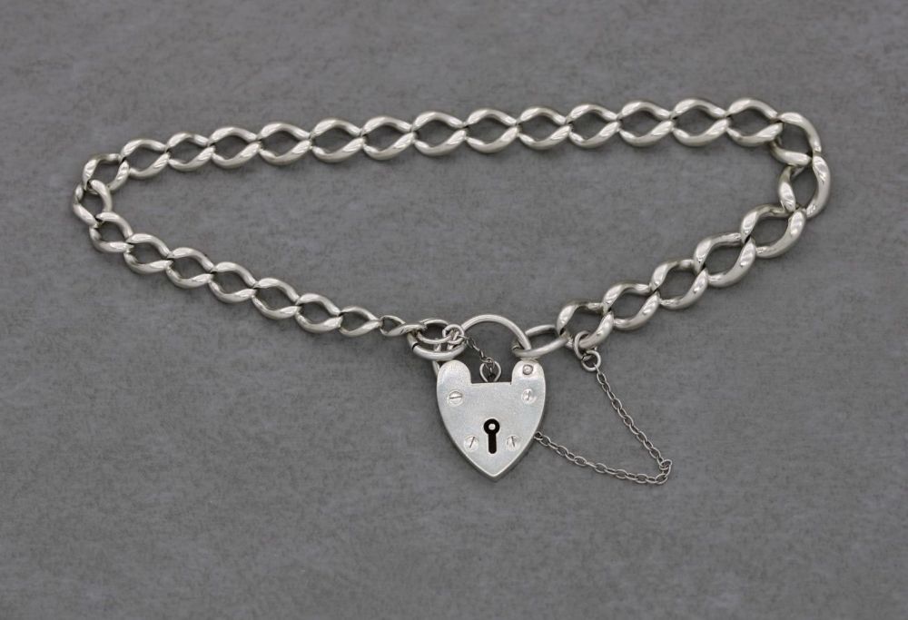Unusual vintage sterling silver charm bracelet with heart padlock & safety 