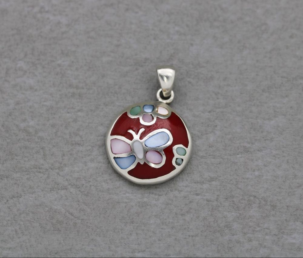 Small sterling silver butterfly pendant with dyed mother of pearl & red ena
