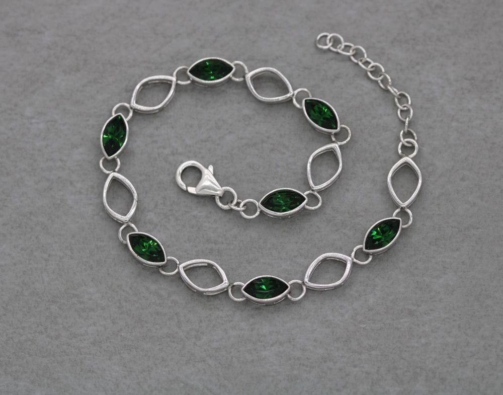 Sterling silver bracelet with green marquise stones