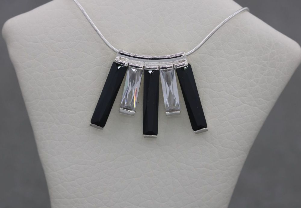 Sterling silver fringe necklace with faceted black & clear stones