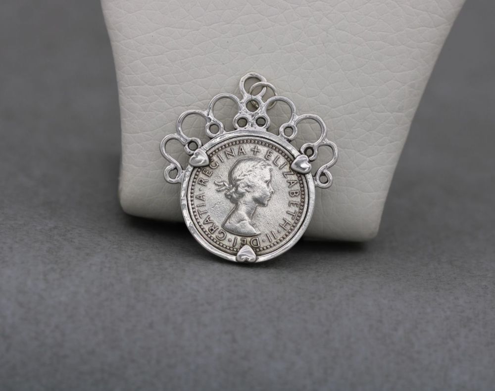 Vintage silver mounted six pence coin pendant