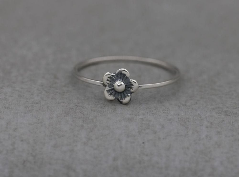 Delicate handmade sterling silver flower ring