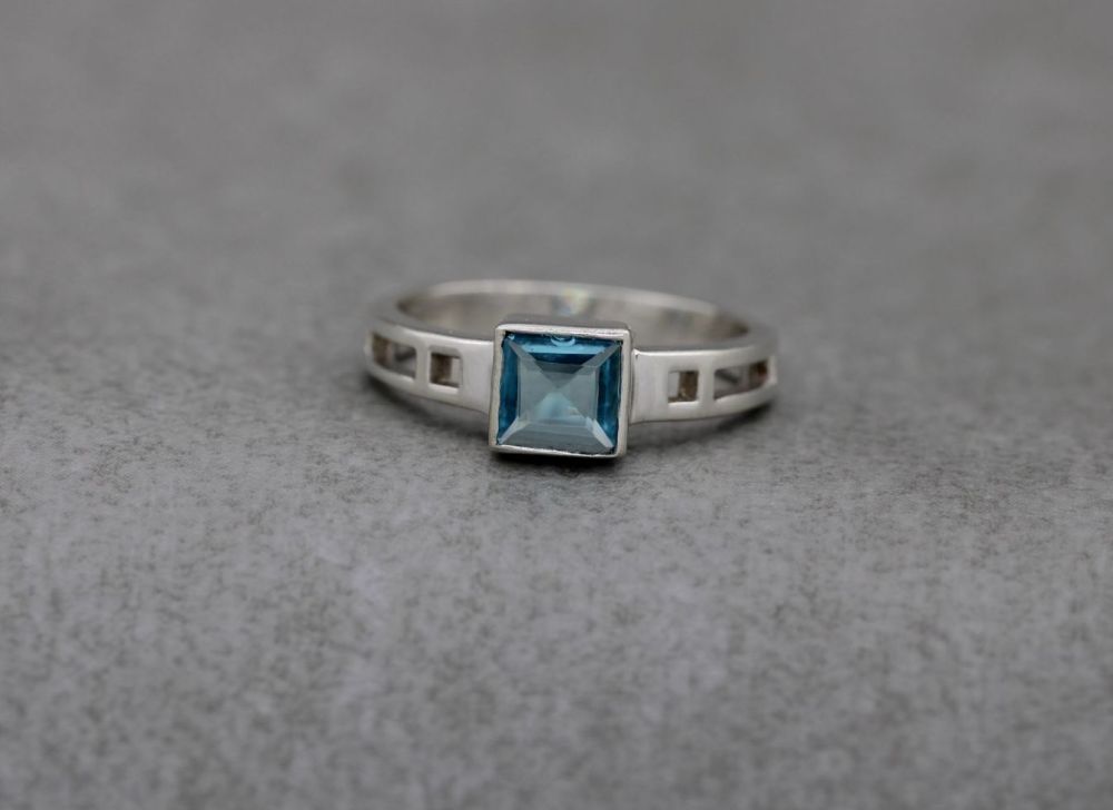 Square sterling silver & blue stone solitaire ring with cut-out shoulder de