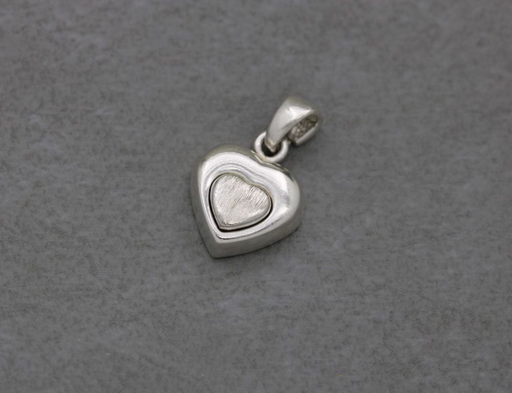 Small chunky sterling silver heart pendant with textured centre & cut-out b