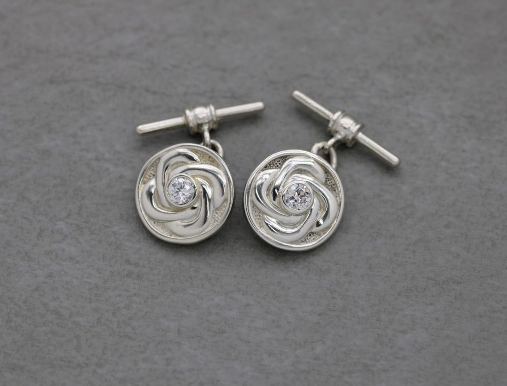 Circular Celtic sterling silver cuff-links with clear stones