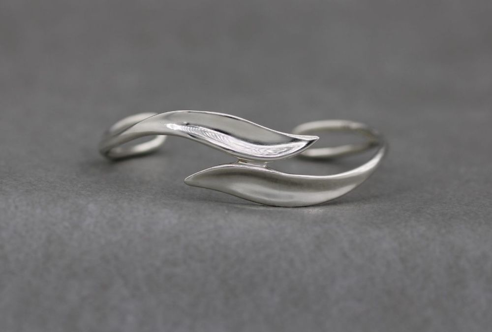 Modernist sterling silver bypass style cuff