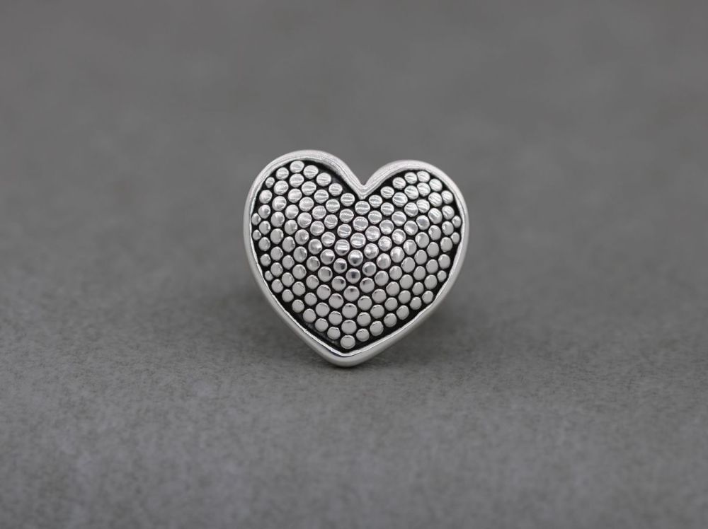 Bold sterling silver dotty heart ring