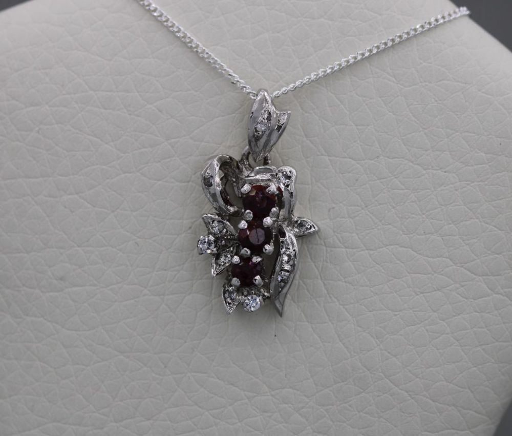 Small fancy sterling silver & garnet necklace
