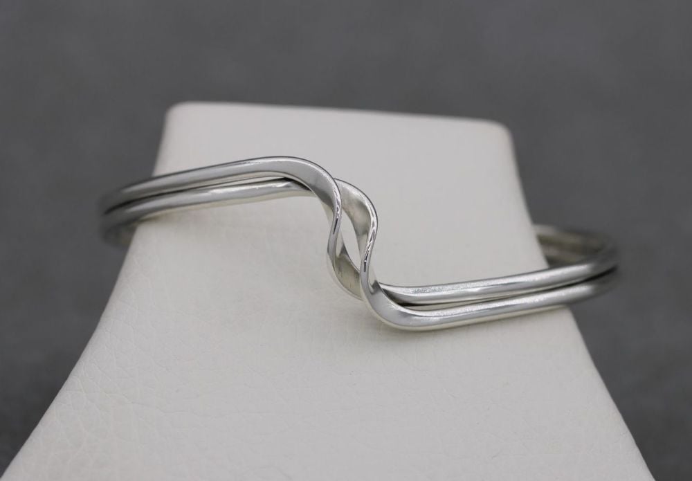 Sterling silver double strand cuff with a twist