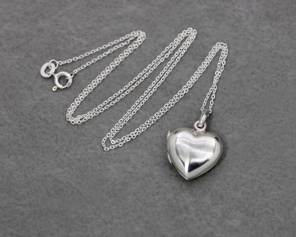 Small sterling silver heart shaped locket & chain
