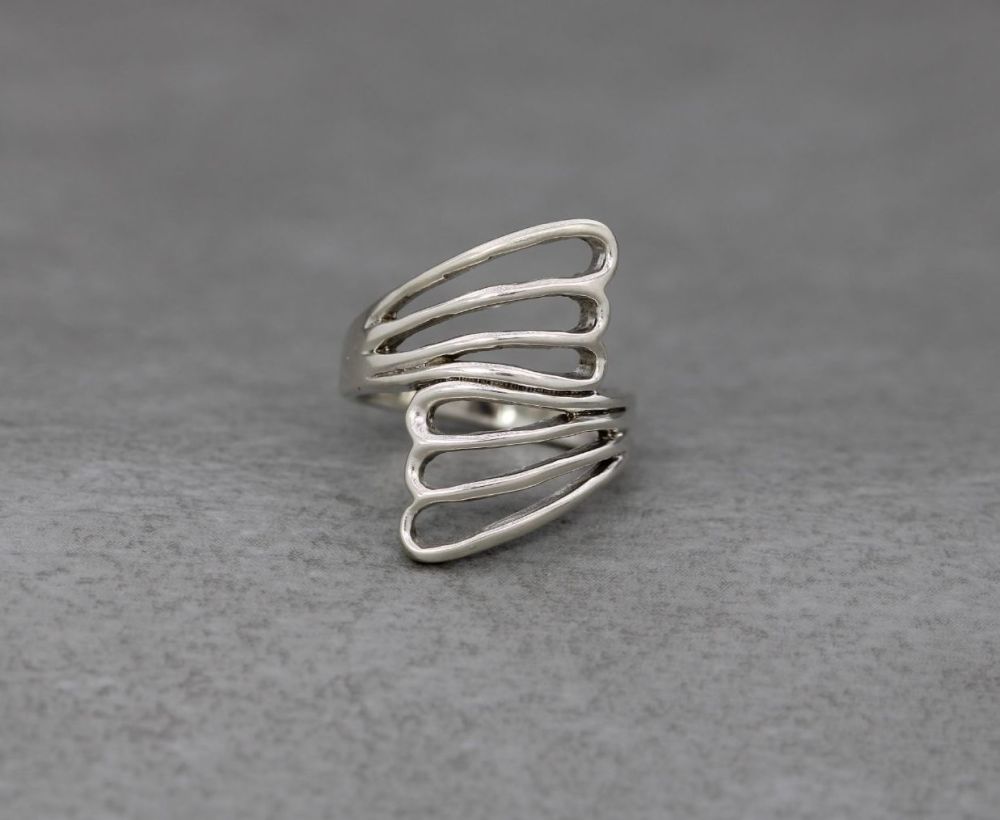 Long sterling silver looped bypass ring