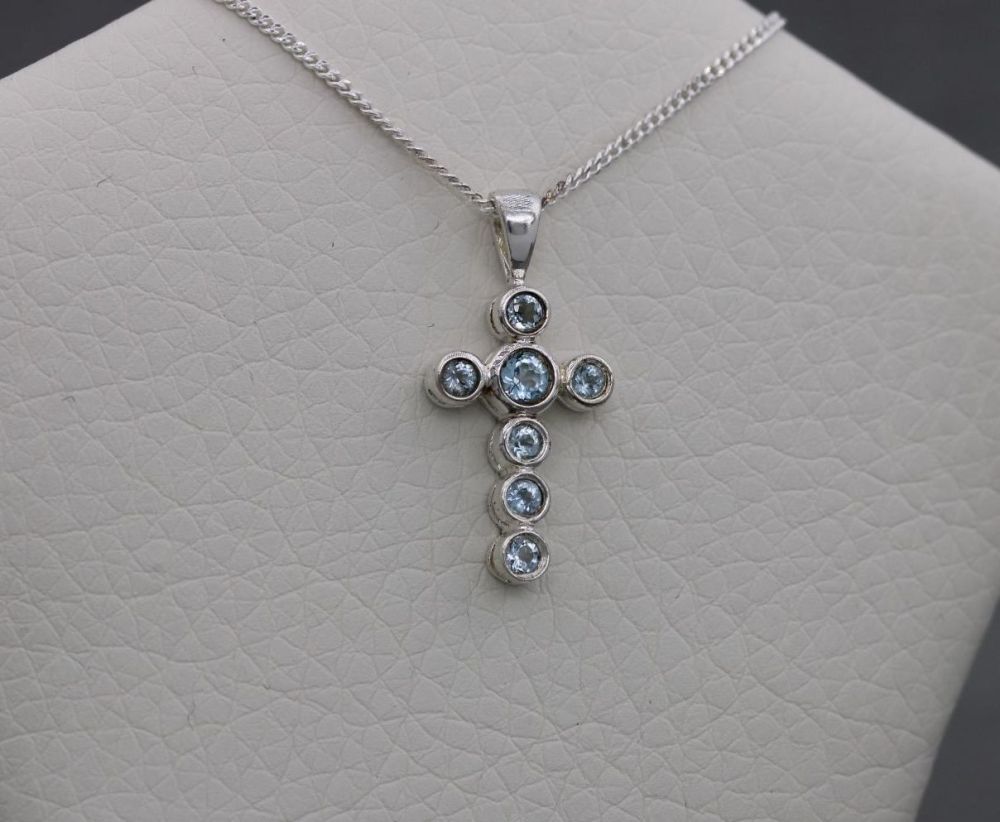 NEW Small sterling silver & pale blue stone cross necklace