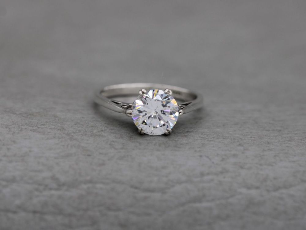 Fancy sterling silver & clear stone solitaire ring