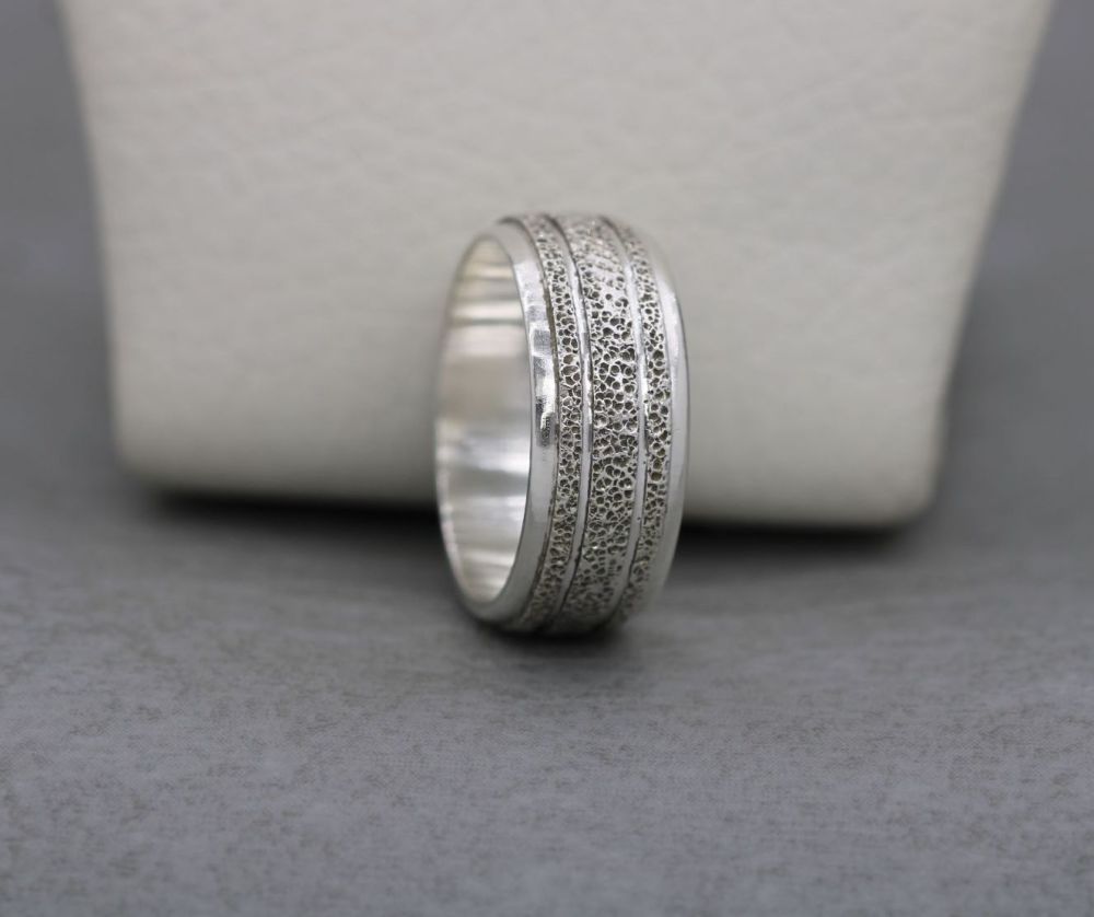 Textured sterling silver band ring