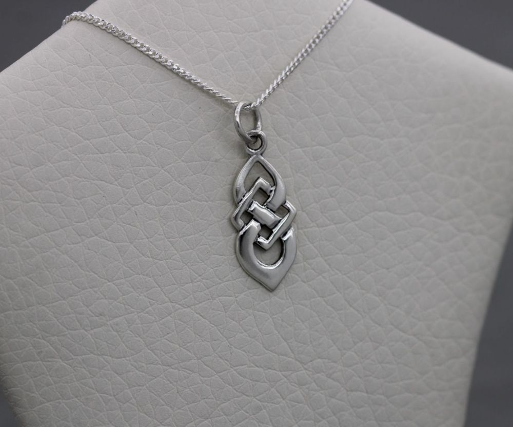 Tiny sterling silver celtic knot necklace