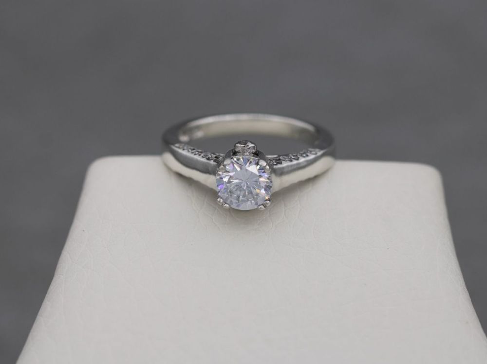 Fancy sterling silver & clear stone solitaire ring with accents