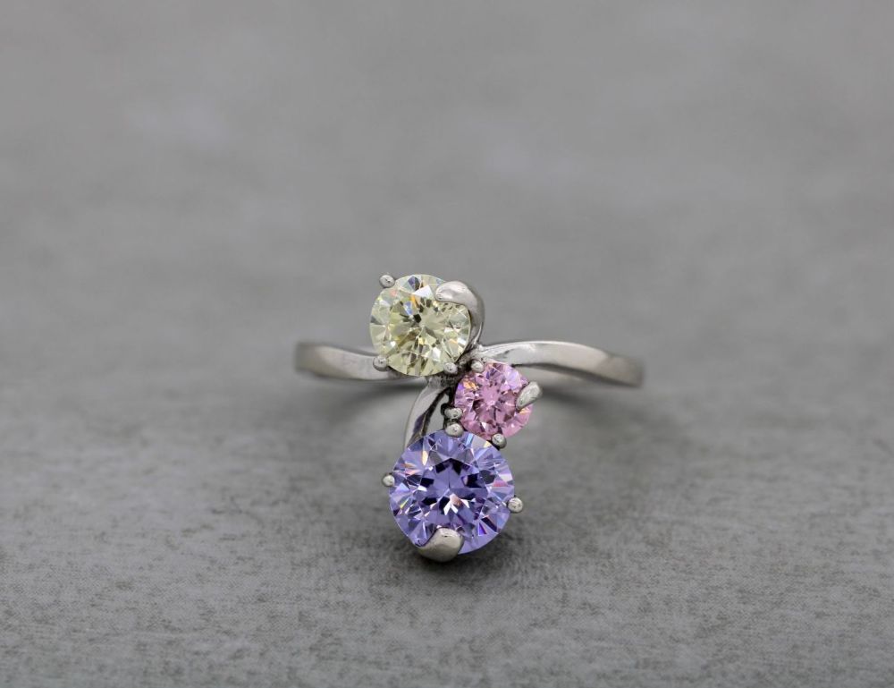 Asymmetric sterling silver ring with multi-colour stones