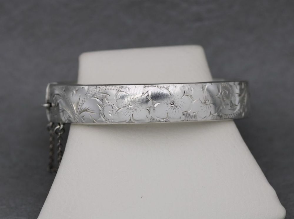 Vintage sterling silver floral engraved bangle with safety chain