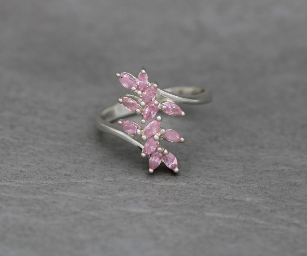 Sterling silver bypass ring with pink marquise stones