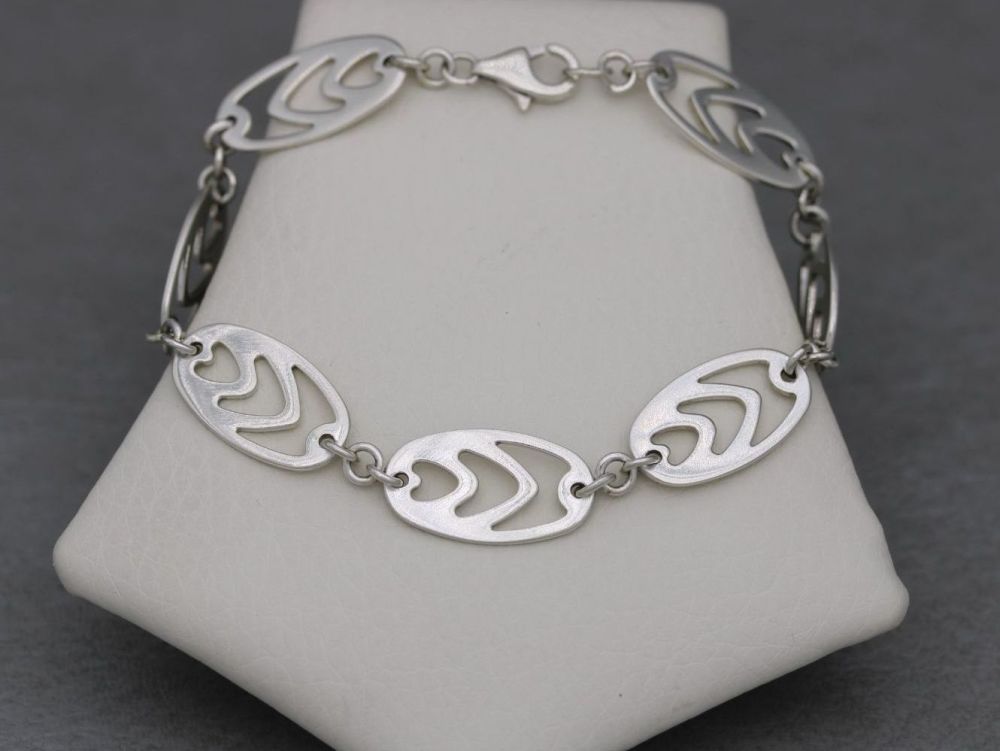 Fancy sterling silver bracelet with cut-out ovals