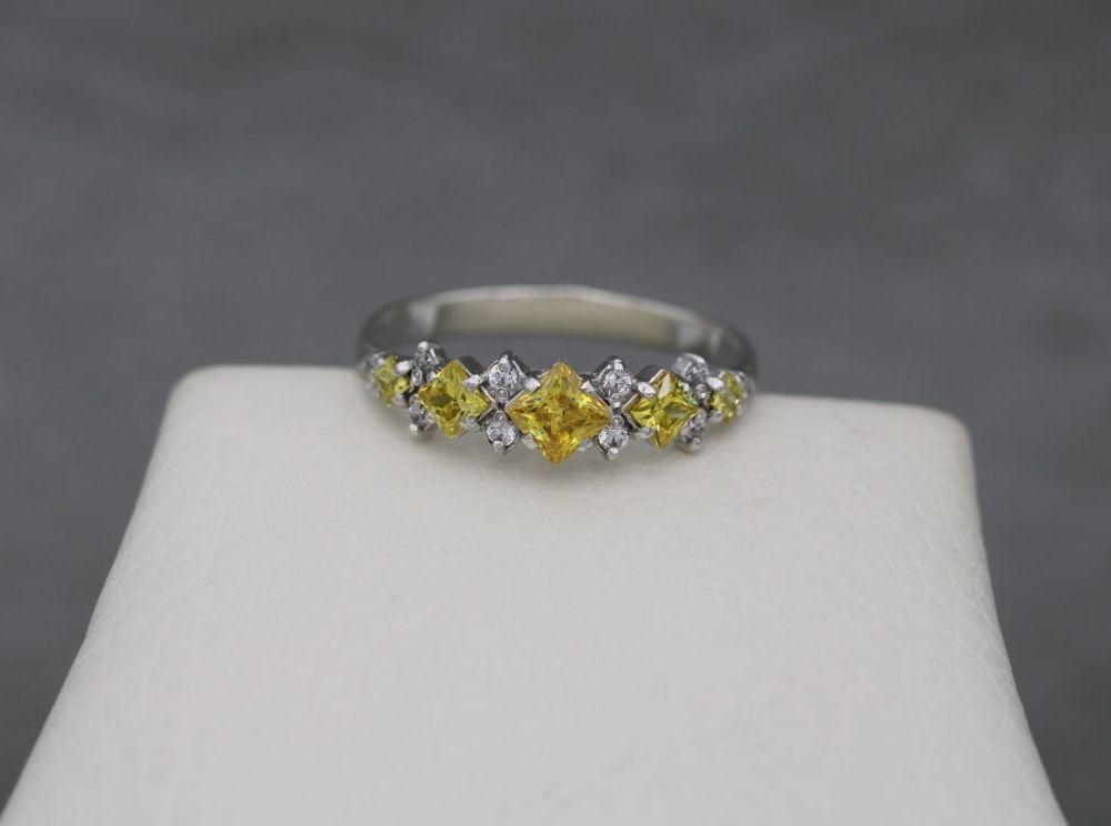 Fancy sterling silver ring with lemon & clear stones
