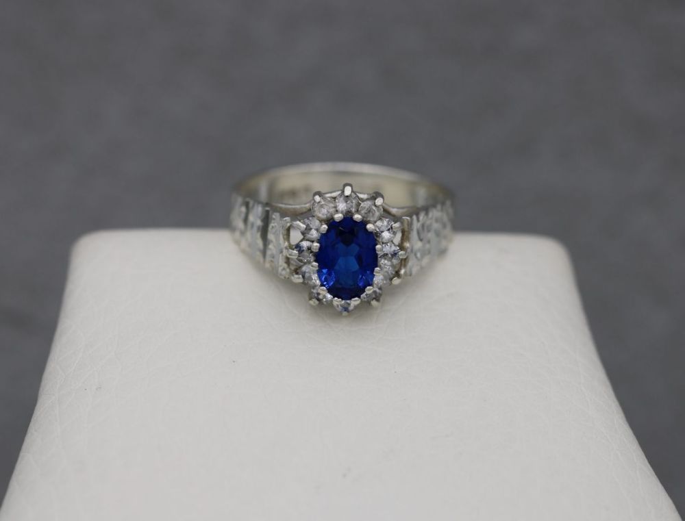 Vintage sterling silver cluster ring with blue & clear stones